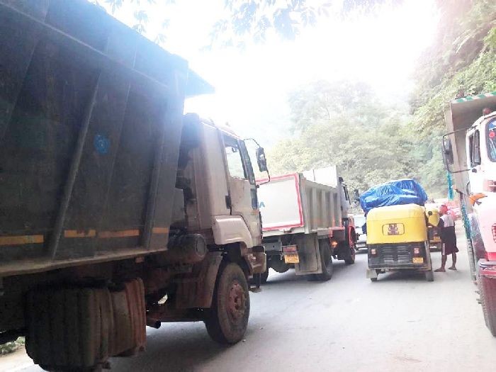 Vehicles are seen stranded on the National Highway-29 near the Patkai Bridge (Chathe River Bridge) after another rockslide on October 10. (Morung Photo)